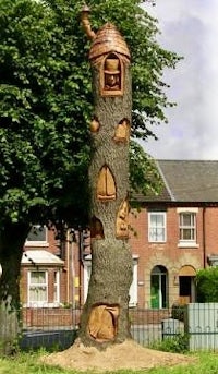 a tree with a house made out of it