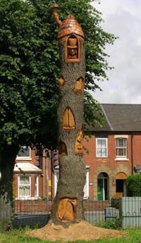 a tree with a house made out of it