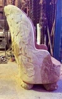 a chair that has been carved out of stone