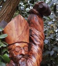 a wooden statue of st john the baptist