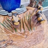 bees on a tree stump